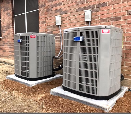 Two American Standard HVAC units outside a customer's residence