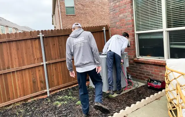 Jaric A/C & Heating techs are doing an inspection on a customer unit.